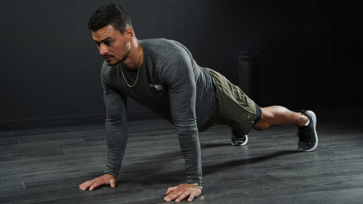 Dumbbell deficit push-up exercise instructions and video
